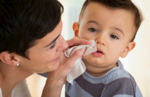 women with boy holding natural baby wipes