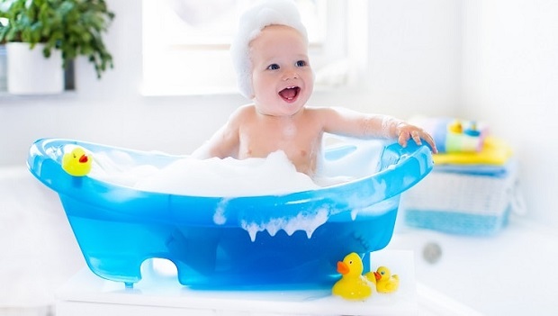 picture of a baby in a toddler bath tub